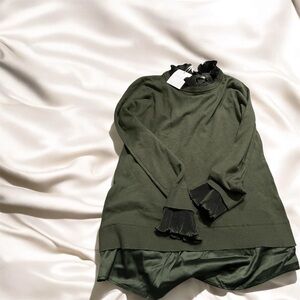 Green embellished sweater